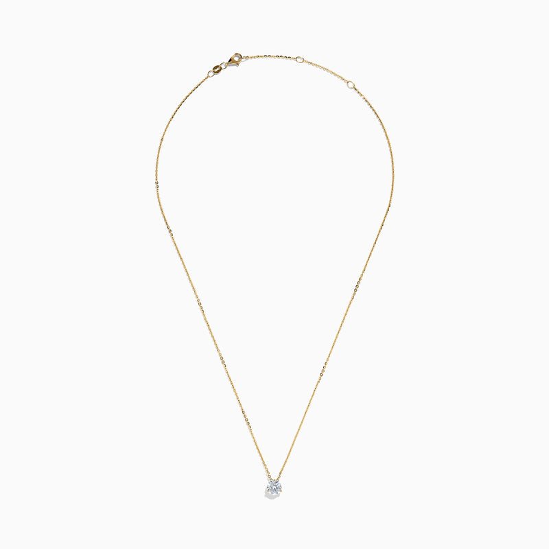 The Lab Grown Diamond Earring and Necklace Set in 14K Yellow Gold features a round diamond pendant and matching gold stud earrings, each showcasing a single round lab grown diamond, displayed on a white background.