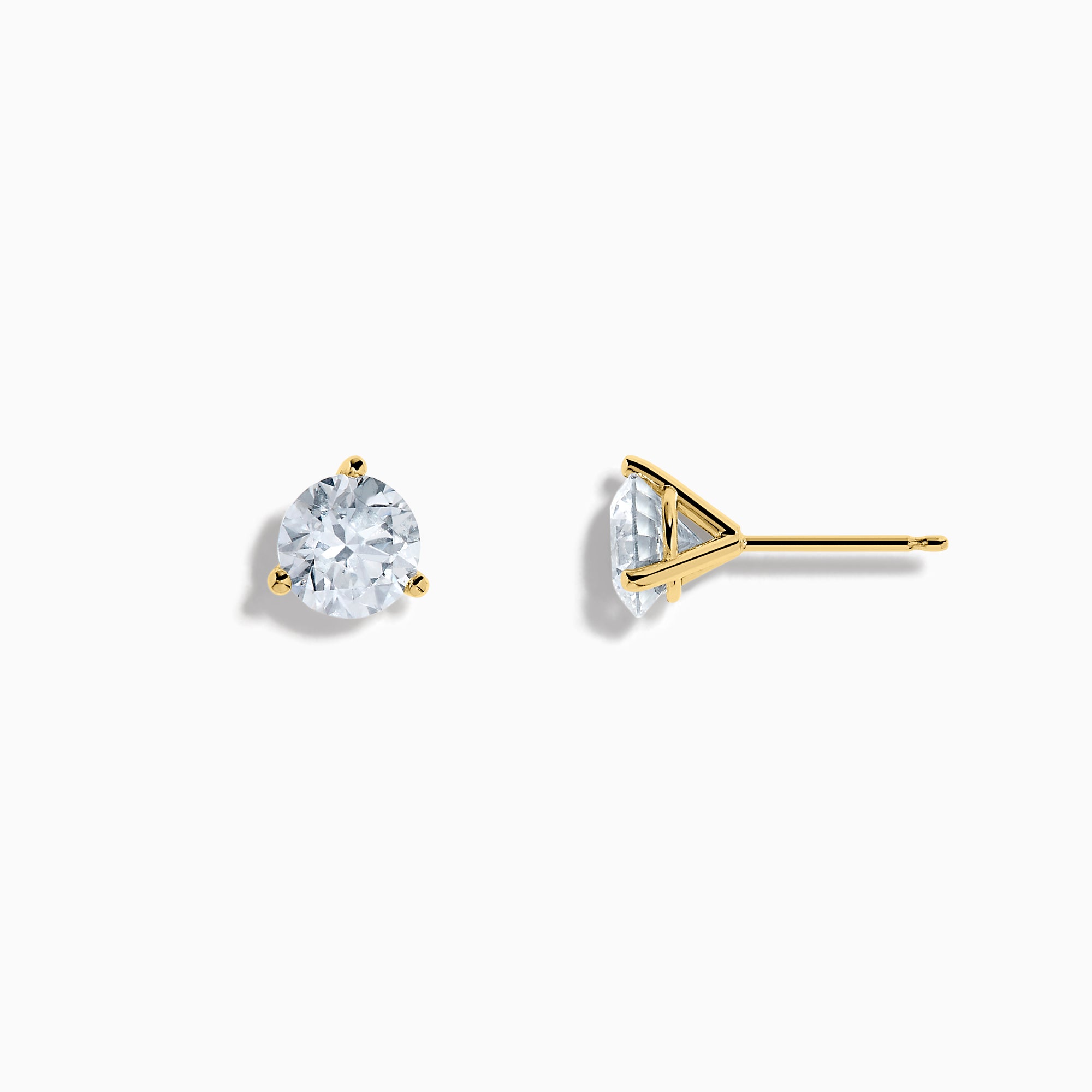 The Lab Grown Diamond Earring and Necklace Set in 14K Yellow Gold features a round diamond pendant and matching gold stud earrings, each showcasing a single round lab grown diamond, displayed on a white background.