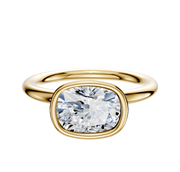 A 14K yellow gold Bezel Full Bezel East/West Classic Dome 2.0mm engagement ring featuring a cushion-cut, clear diamond, shown on a plain white background.
