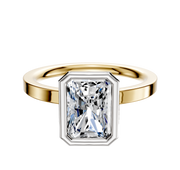 An 18K Two Tone Bezel Full Bezel North/South Classic Flat 2.0mm Engagement Ring featuring a rectangular, radiant-cut clear gemstone in a white metal bezel setting, displayed on a white background.