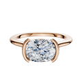 The 18K Rose Gold Bezel Half Bezel East/West Cathedral Dome 1.5mm Engagement Ring features a large oval-cut diamond in an east-west setting, secured by two curved prongs, shown against a plain white background.