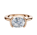 A 14K rose gold half bezel East/West cathedral dome engagement ring with a modern open setting, shown against a plain white background.