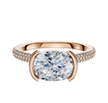 An 18K rose gold engagement ring featuring a bezel half bezel east/west cathedral dome design with a 3-row pave and 2.0mm band.
