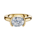 The 14K Yellow Gold Bezel Half Bezel East/West Cathedral Dome 3.0mm Engagement Ring features a wide band and a horizontally set gemstone in a modern partial bezel setting.