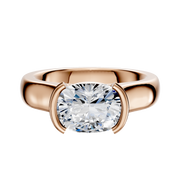 A 14K rose gold engagement ring with a wide cathedral dome band, showcasing a 4.0mm diamond in an east/west half bezel setting.