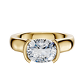 The 18K Yellow Gold Bezel Half Bezel East/West Cathedral Dome 4.0mm Engagement Ring showcases a prominent oval-cut clear gemstone set horizontally in a half bezel, shown against a plain white background.