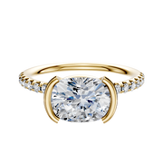 The 14K Yellow Gold Bezel Half Bezel East/West Classic Dome Engagement Ring features a 2.5mm band with one row of pave-set diamonds, showcasing a unique east/west bezel setting for a modern, elegant look.
