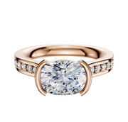 The 18K Rose Gold Bezel Half Bezel East/West Cathedral Flat 1-Row-Pave 2.5mm Engagement Ring features an oval center diamond in a bezel setting with small round pave diamonds along the band, displayed on a white background.