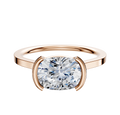 An 18K rose gold Bezel Half Bezel East/West Cathedral Flat 1.5mm engagement ring is shown on a white background.