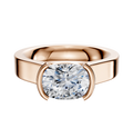 A 14K rose gold East/West cathedral engagement ring with a flat half-bezel setting and a 4.0mm oval-cut diamond, shown against a plain white background.