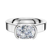 A Platinum Bezel Half Bezel East/West Cathedral Flat 4.0mm Engagement Ring with a thick band and large oval-cut clear gemstone, held by two partial prongs on each side, displayed against a plain white background.