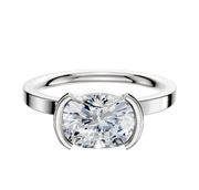 A 14K White Gold Bezel Half Bezel East/West Classic Flat 2.0mm Engagement Ring is displayed against a plain white background, showcasing its elegant modern setting.