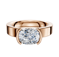 A 14K rose gold engagement ring with a classic flat 4.0mm band, showcasing an east/west-set oval diamond in a modern half-bezel setting.