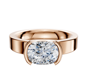 A 14K rose gold engagement ring with a classic flat 4.0mm band, showcasing an east/west-set oval diamond in a modern half-bezel setting.