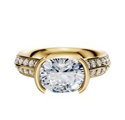 A 14K yellow gold bezel half bezel east/west cathedral knife edge engagement ring with a 1-row pavé band and a 2.5mm center stone, shown against a plain white background.