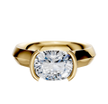 An 18K yellow gold half bezel East/West cathedral knife edge engagement ring with a 4.0mm cushion-cut diamond, shown on a plain white background.