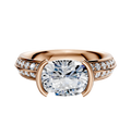 The 14K Rose Gold Bezel Half Bezel East/West Classic Knife Edge 1-Row-Pave 2.5mm Engagement Ring features a sleek design with sparkling pave diamonds along the band, displayed on a white background.