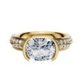 A 14K yellow gold east/west classic knife edge engagement ring featuring a half bezel setting and a single row of pave diamonds along the 2.5mm band.