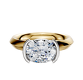A 14K two tone engagement ring with a classic knife edge 3.0mm band and east/west half bezel setting, showcased on a plain white background.