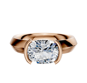 The 18K Rose Gold Bezel Half Bezel East/West Classic Knife Edge 4.0mm Engagement Ring showcases a large cushion-cut diamond in a modern, minimalist bezel setting against a plain white background.