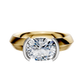 An 18K two-tone bezel half bezel East/West classic knife edge 4.0mm engagement ring is shown against a plain white background, featuring a modern design with a striking, thick band and elegant setting.