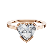 A 14K rose gold engagement ring, featuring a flat 1.5mm band in an east/west cathedral bezel setting, displayed against a plain white background.
