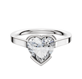 A 14K white gold bezel half bezel east/west cathedral flat 2.0mm engagement ring with a large heart-shaped clear diamond centerpiece, features a polished band and is displayed against a plain white background.