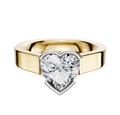 A 14K two-tone engagement ring with a flat 4.0mm band in an east/west cathedral style, featuring a half bezel setting for the center stone.