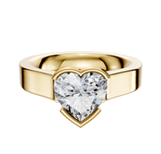 A 14K yellow gold bezel half bezel east/west cathedral flat 4.0mm engagement ring is shown, featuring a sleek, polished band and photographed against a plain white background.