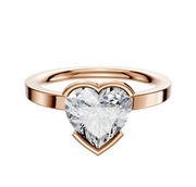 A 14K rose gold bezel half bezel east/west classic flat 2.0mm engagement ring is displayed against a plain white background.