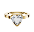 An 18K yellow gold Bezel Half Bezel East/West Classic Flat 2.0mm engagement ring is showcased as the centerpiece, set against a plain white background.