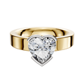 An 18K two-tone half bezel east/west classic flat 4.0mm engagement ring is shown on a plain light background, showcasing its wide band and elegant, modern design.