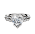 An 18K white gold engagement ring with a half bezel east/west cathedral knife edge band, featuring a 1-row pave of small diamonds, is displayed on a white background.