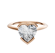 A 14K rose gold Bezel Half Bezel East/West Cathedral Knife Edge 1.5mm engagement ring is displayed against a plain white background.