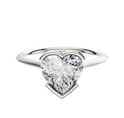 An 18K white gold bezel half bezel east/west cathedral knife edge 1.5mm engagement ring showcased against a plain white background.