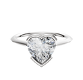 An 18K white gold bezel half bezel east/west cathedral knife edge 1.5mm engagement ring, photographed against a plain white background.