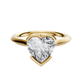 An 18K yellow gold bezel half bezel east/west cathedral knife edge 2.0mm engagement ring is displayed against a plain white background.