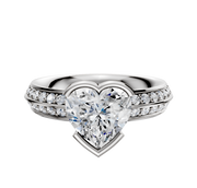 The 18K White Gold Bezel Half Bezel East/West Classic Knife Edge 1-Row-Pave 2.5mm Engagement Ring features a classic knife-edge band with a single row of pave diamonds, set against a simple white background.