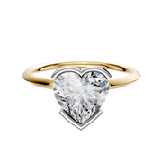 The 14K Two Tone Bezel Half Bezel East/West Classic Knife Edge 1.5mm Engagement Ring, featuring a sleek two-tone design, is showcased on a plain white background.
