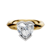 A 14K two-tone engagement ring with a classic knife edge and 3.0mm half bezel east/west setting, showcased against a plain white background.
