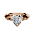 The 18K Rose Gold Bezel Half Bezel East/West Classic Knife Edge 4.0mm Engagement Ring features a prominent center stone and is displayed against a plain white background.