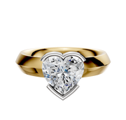 A 14K two tone bezel half bezel east/west classic knife edge 4.0mm engagement ring is showcased against a plain white background.
