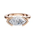 The 14K Rose Gold Bezel Half Bezel East/West Cathedral Dome 2.0mm Engagement Ring features a horizontally-set marquise-cut diamond in a modern, polished band with unique curved prongs for an elegant, contemporary look.