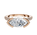 The 14K Rose Gold Bezel Half Bezel East/West Cathedral Dome 3-Row-Pave 2.0mm Engagement Ring features a central marquise diamond and sparkling round diamonds in three rows along the upper band.