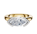 The 18K Two Tone Bezel Half Bezel East/West Cathedral Dome 3.0mm Engagement Ring features a large marquise-cut clear gemstone in a unique white metal prong setting, shown against a plain white background.