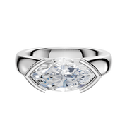 A 14K white gold cathedral dome ring featuring a 4.0mm diamond set east/west in a modern half-bezel setting with a thick, polished band for enhanced brilliance.