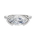 The 18K Two Tone Bezel Half Bezel East/West Classic Dome 1-Row-Pave 2.5mm Engagement Ring features a stylish two-tone design with a half bezel east/west setting and a row of pave diamonds along the classic dome band.