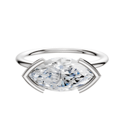 A 14K white gold East/West Classic Dome engagement ring with a 1.5mm band, featuring a large oval-cut white gemstone in a modern half bezel setting, displayed against a plain white background.