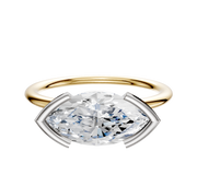 A 14K two-tone Bezel Half Bezel East/West Classic Dome 1.5mm engagement ring featuring a large oval diamond set horizontally with silver prongs, shown against a plain white background.