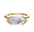 A 14K yellow gold engagement ring with a classic dome design and a 2.0mm east/west half bezel setting, shown against a plain white background.